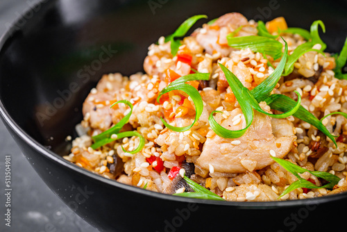 traditional chinese fried rice on black background