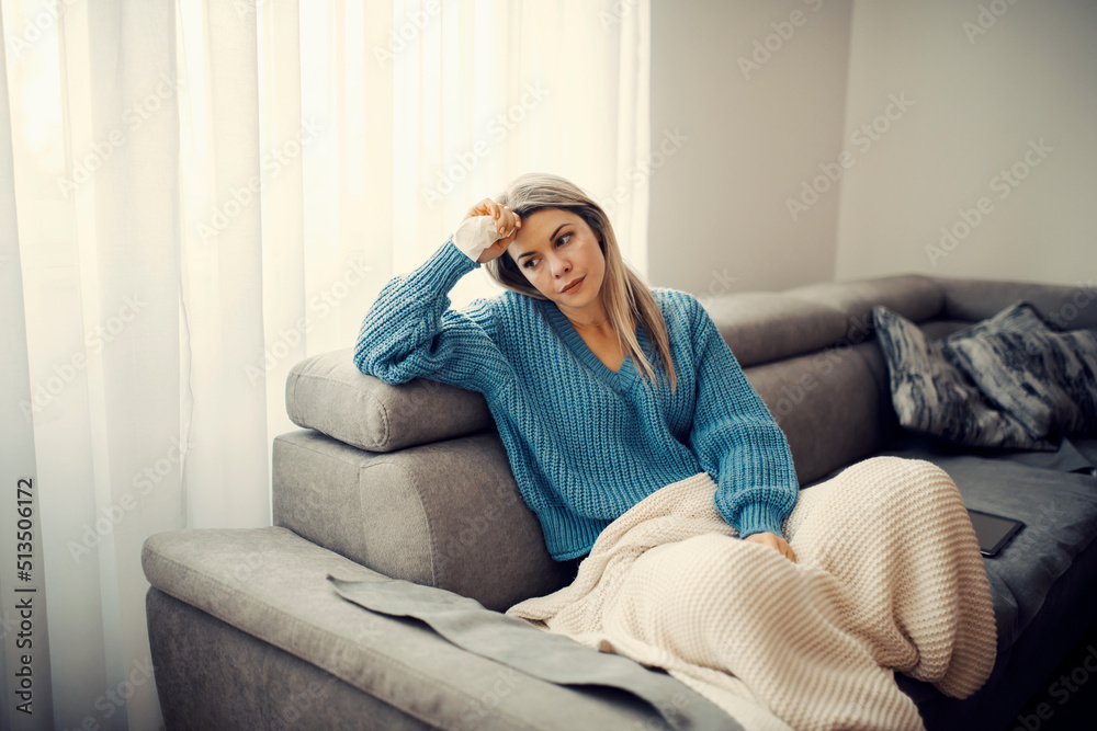 Obraz premium An ill woman staying at home.