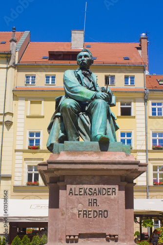 Old Statue of the Polish poet, playwright and comedy writer Aleksander Fredro on the Market Square in front of the Town Hall of Wroclaw, Poland 