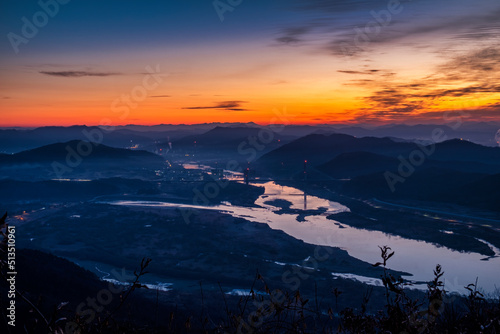 Scenic view of mountains against sky during sunrise