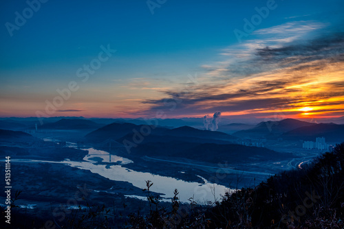 Scenic view of mountains against sky during sunrise