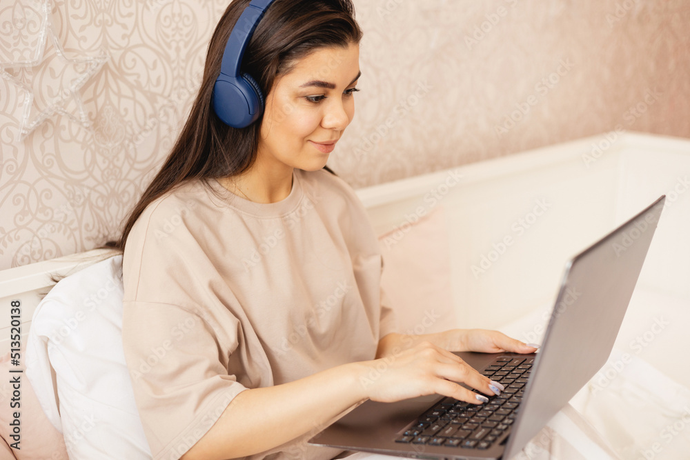A girl studies or works remotely at home and home office A girl studies or works remotely at home and home office