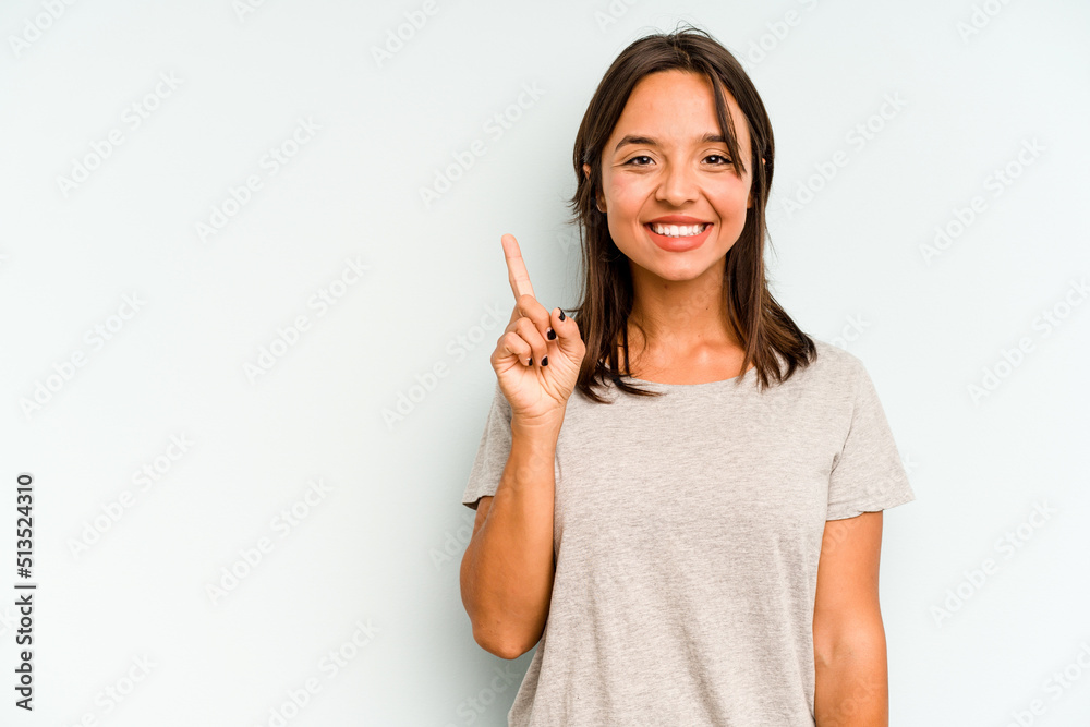 Young hispanic woman isolated on blue background having an idea, inspiration concept. Young hispanic woman isolated on blue background having an idea, inspiration concept.