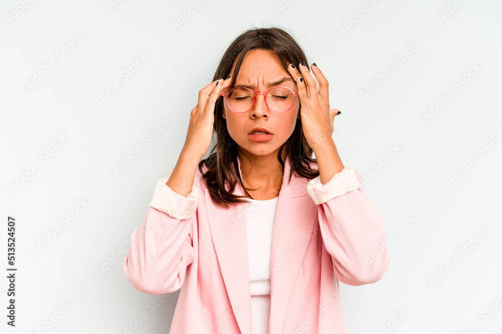 Young hispanic woman isolated on blue background rejecting someone showing a gesture of disgust. Young hispanic woman isolated on blue background rejecting someone showing a gesture of disgust.