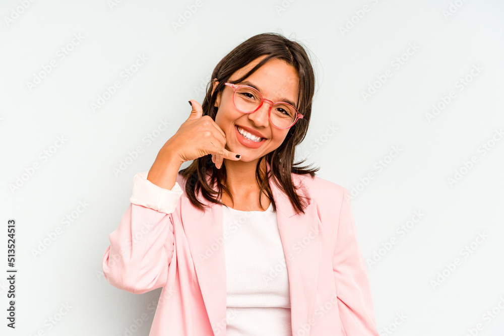 Young hispanic woman isolated on blue background tired and very sleepy keeping hand on head. Young hispanic woman isolated on blue background tired and very sleepy keeping hand on head.