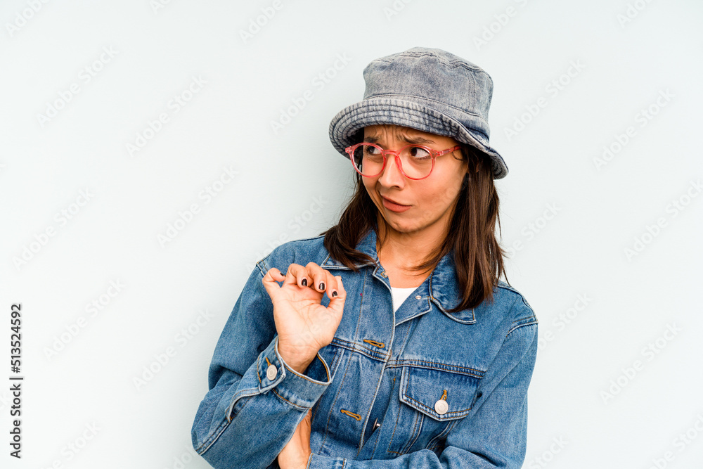 Young hispanic woman isolated on blue background raising both thumbs up, smiling and confident. Young hispanic woman isolated on blue background raising both thumbs up, smiling and confident.