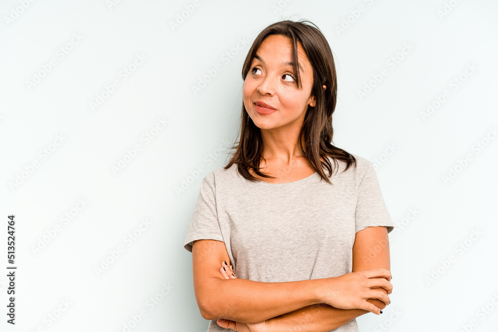 Young hispanic woman isolated on blue background crying, unhappy with something, agony and confusion concept. Young hispanic woman isolated on blue background crying, unhappy with something, agony and confusion concept.