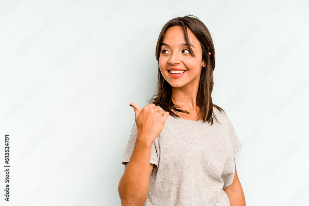 Young hispanic woman isolated on blue background covering ears with fingers, stressed and desperate by a loudly ambient. Young hispanic woman isolated on blue background covering ears with fingers, stressed and desperate by a loudly ambient.