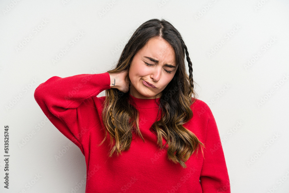 Young caucasian woman isolated on white background having a neck pain due to stress, massaging and touching it with hand. Young caucasian woman isolated on white background having a neck pain due to stress, massaging and touching it with hand.