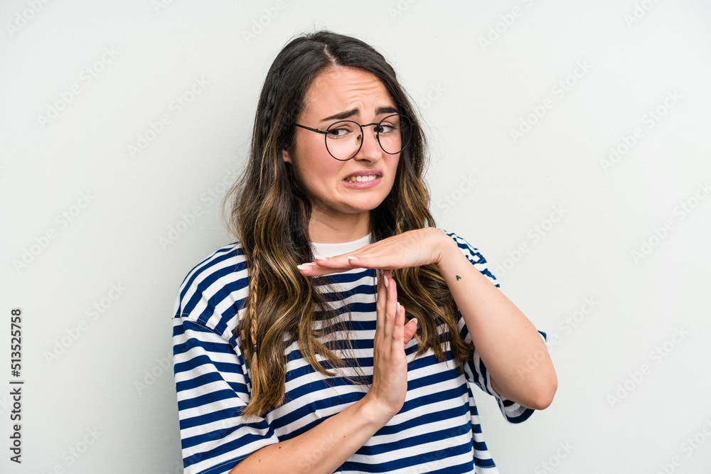 Young caucasian woman isolated on white background showing a timeout gesture. Young caucasian woman isolated on white background showing a timeout gesture.