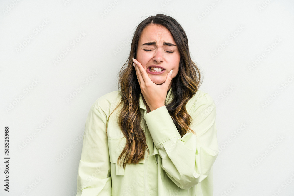 Young caucasian woman isolated on white background having a strong teeth pain, molar ache. Young caucasian woman isolated on white background having a strong teeth pain, molar ache.