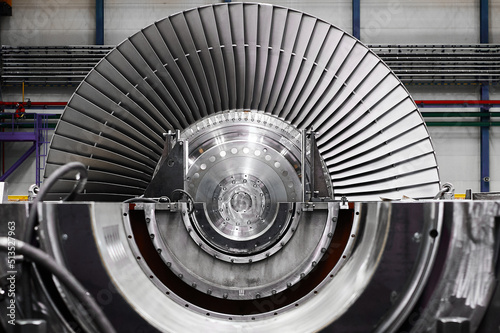 A powerful steam turbine rotor is installed in the lodgment of the steam turbine base. photo