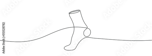 Continuous line drawing of socks. Socks one line icon. One line drawing background. Vector illustration. Socks black icon