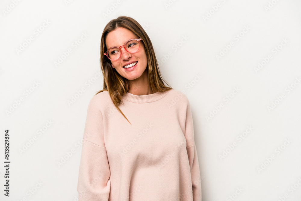 Young caucasian pregnant woman isolated on white background laughs and closes eyes, feels relaxed and happy. Young caucasian pregnant woman isolated on white background laughs and closes eyes, feels relaxed and happy.