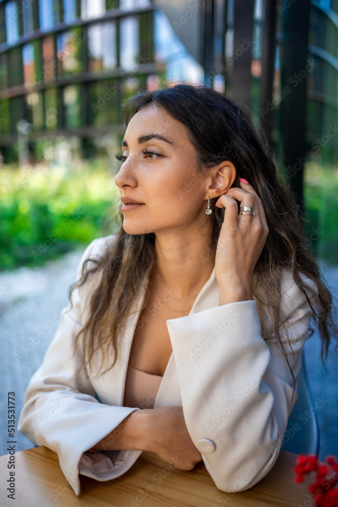 Close up portrait of a professional business woman siting outdoor