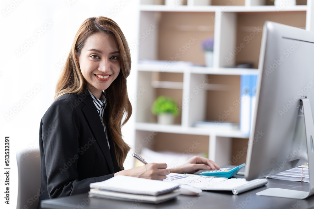 Asian business woman working in office with laptop paper work, Business woman concept. Asian business woman working in office with laptop paper work, Business woman concept.