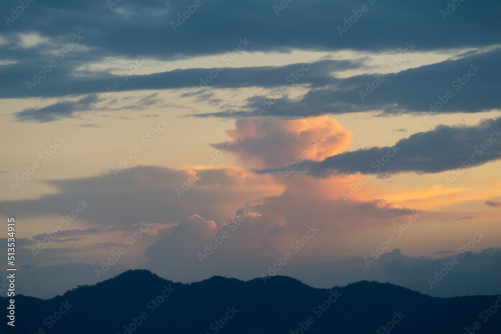 Sunset, clouds, beautiful color changing over the mountains, beautiful colors