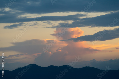 Sunset, clouds, beautiful color changing over the mountains, beautiful colors