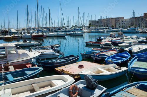 Obraz na płótnie Palermo, Sicily - July 29, 2016: Small port with fishing boats in the center of Mondello w salonie
