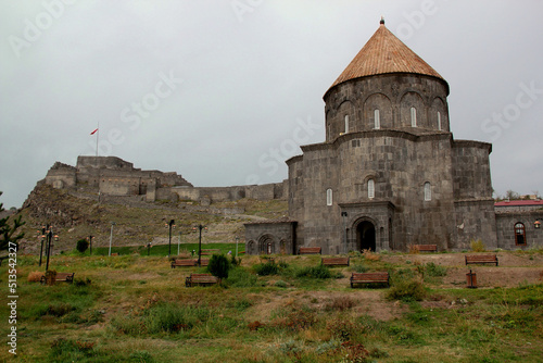 Gray stone church and castle in the background in the historic center of Kars, in the region of Eastern Anatolia, Turkey	 photo