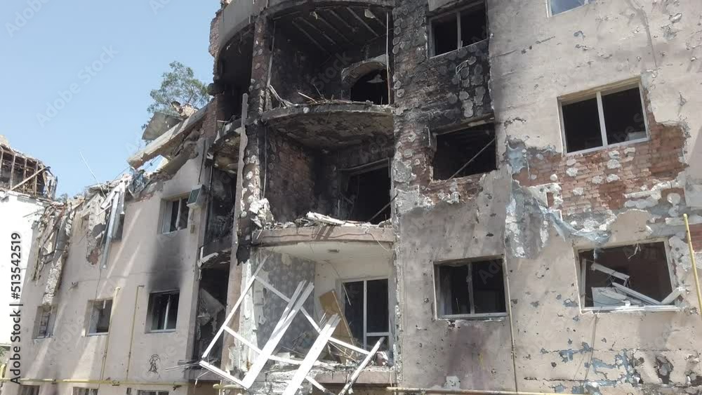 Irpin, Kyiv region, Ukraine - June 2022: Burnt house from rocket bombers of the Russian army. War of Russia against Ukraine. Destroyed houses of civilians of the Russian army. Irpin, Kyiv region, Ukraine - June 2022: Burnt house from rocket bombers of the Russian army. War of Russia against Ukraine. Destroyed houses of civilians of the Russian army.