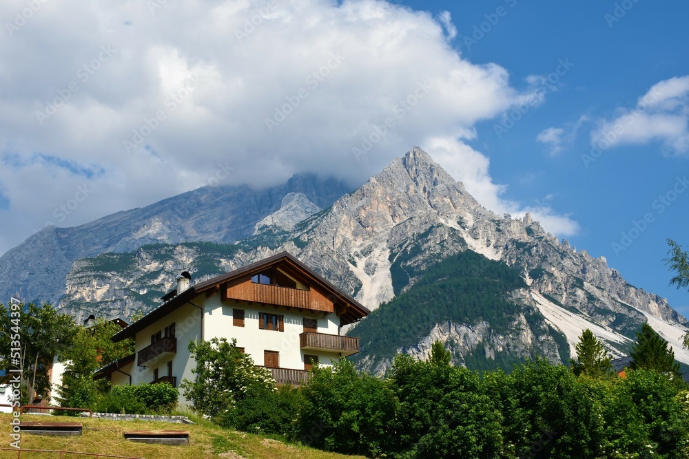 House in San Vito di Cadore village bellow mountain Monte Antelao in the Dolomite Mountains in Veneto region and Belluno province in Italy