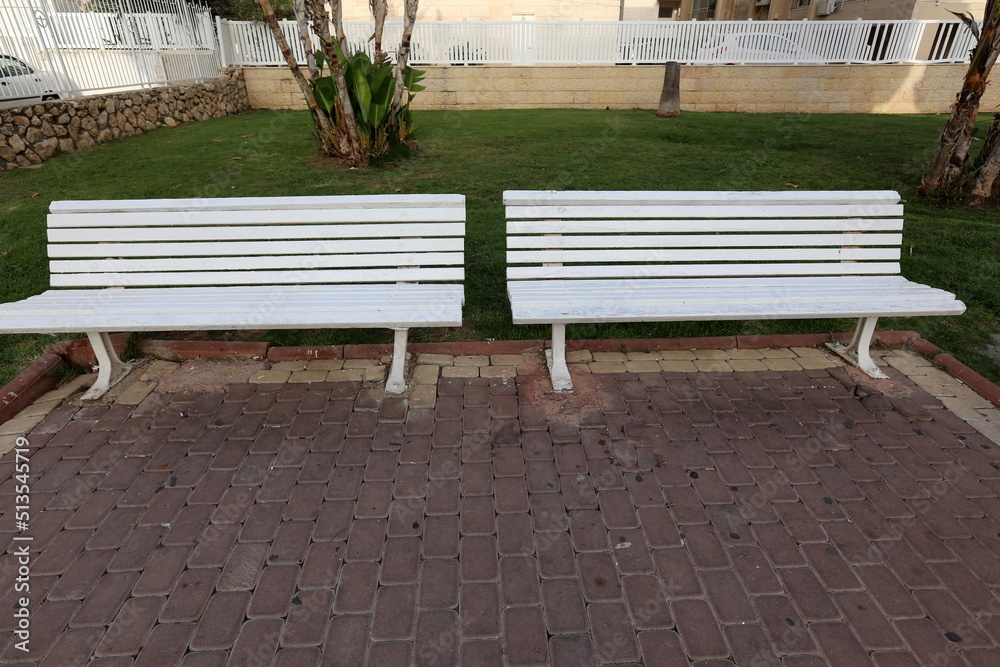 Bench in a city park on the Mediterranean coast Bench in a city park on the Mediterranean coast