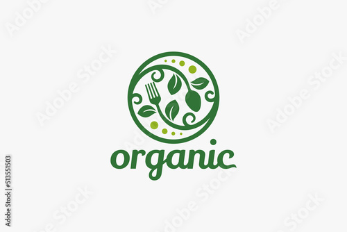 organic food logo with a combination of fork, spoon and plant in a circle.