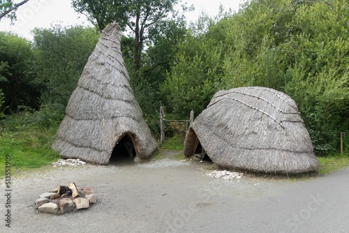 Beautiful view of huts in the Irish National Heritage Park in Ireland