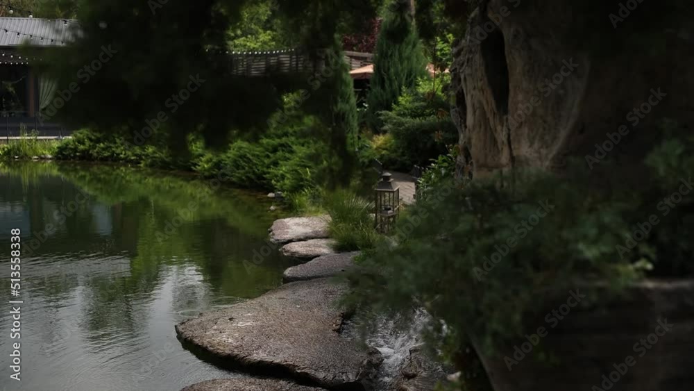 landscape design decorative pond near the restaurant complex in the forest landscape design decorative pond near the restaurant complex in the forest
