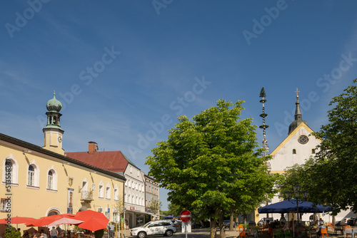 The town square of the town Viechtach with may pole in Lower Bavaria, Germany on a bright sunny summer day
