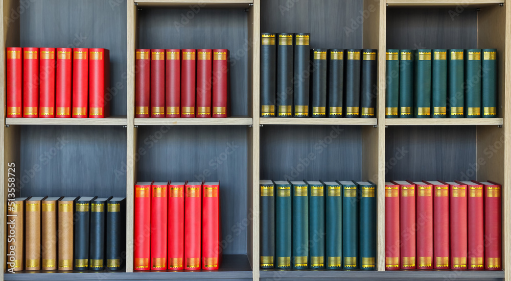 Education concept with books stacked on Book Shelf. Rows of books in the library Education concept with books stacked on Book Shelf. Rows of books in the library