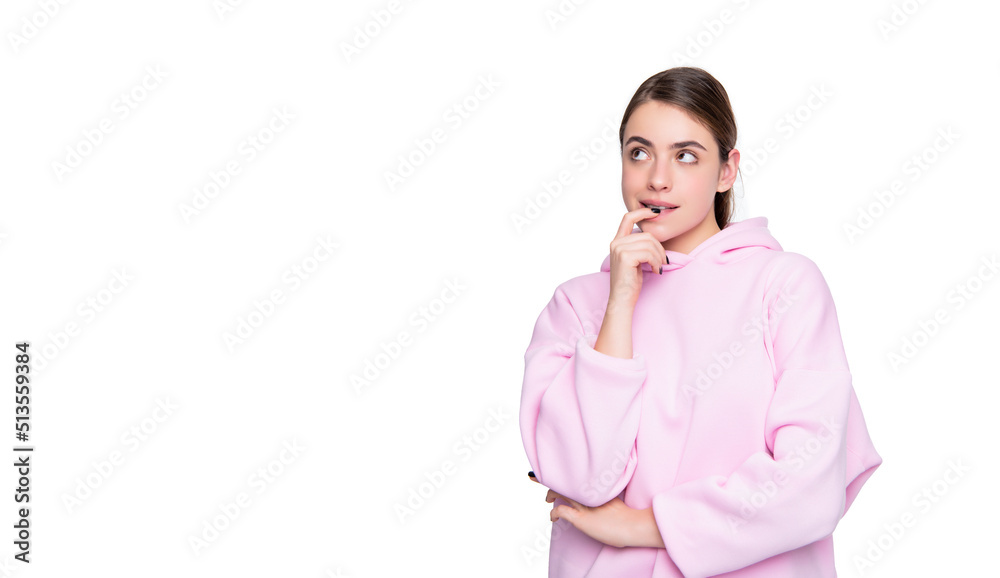 pondering young girl in pink hoodie isolated on white background pondering young girl in pink hoodie isolated on white background
