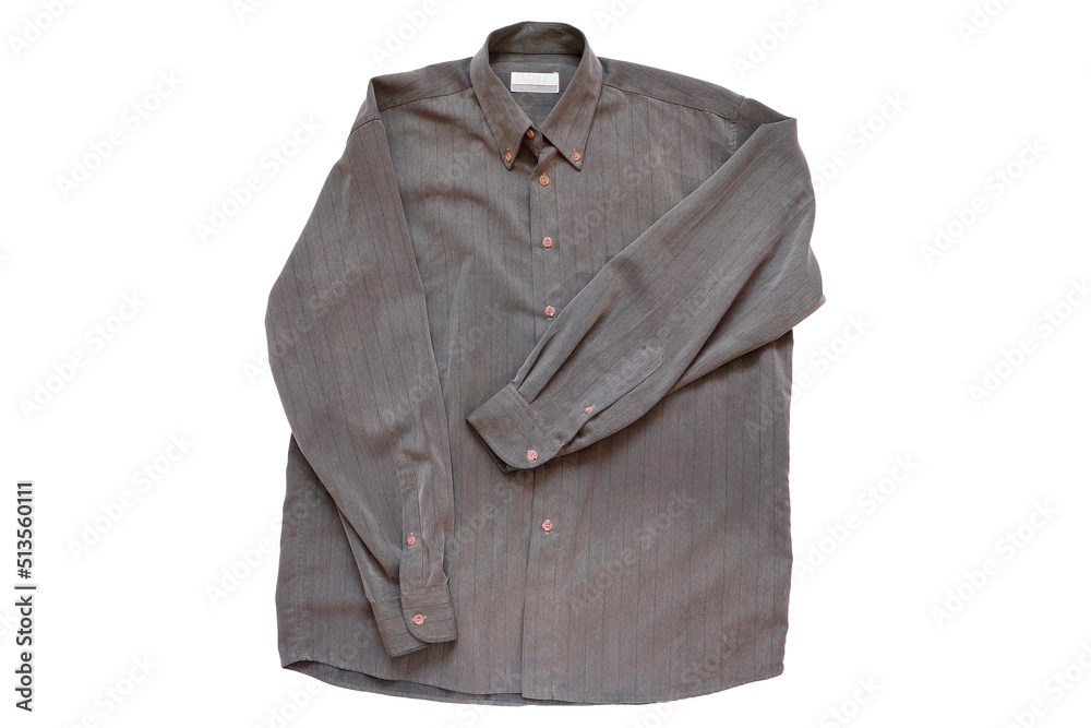 Shirt on a light background. Men's shirt made of cotton. The texture of the fabric. isolated. Shirt on a light background. Men's shirt made of cotton. The texture of the fabric. isolated.