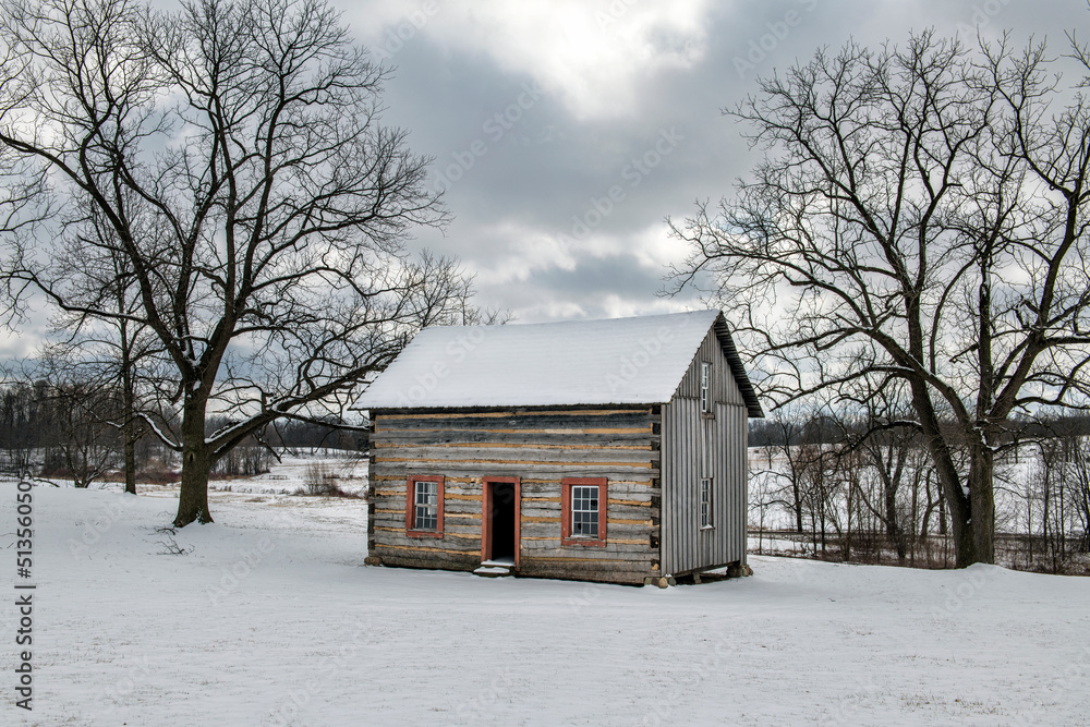 Log Cabin in winter at David Rogers Park, LaGrange County, Indiana. Log Cabin in winter at David Rogers Park, LaGrange County, Indiana.