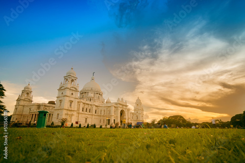 Kolkata, West Bengal, India - July 16th 2017 : Beautiful image of sun set with Victoria Memorial buliding - a landmark public buiding of Kolkata, famous tourist attraction.