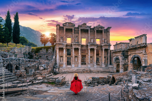 Woman standing in Celsus Library at Ephesus ancient city in Izmir, Turkey. photo