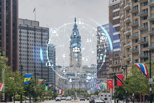 Day time cityscape of Philadelphia financial downtown  Pennsylvania  USA. City Hall neighborhood. Glowing Social media icons. The concept of networking and establishing new connections between people