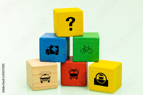 Wooden block with communication and rescue icons and a question mark, Concept of health insurance, rescue, roadside assistance