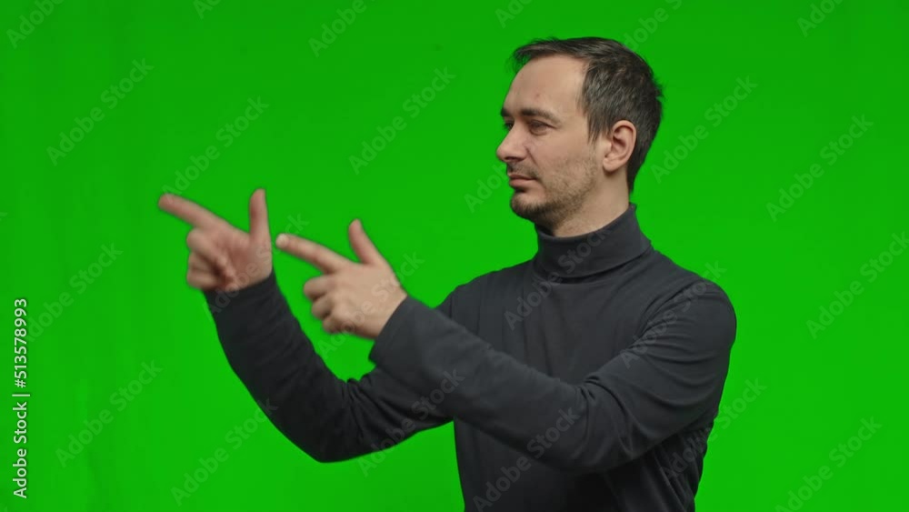 Man pointing finger to the side and presenting a product, showing copy space over isolated background