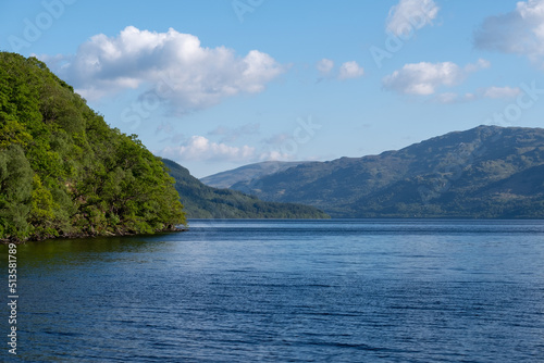 View of the still water at Loch Lomond, Highlands of Scotland, UK.