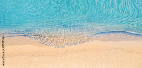 Relaxing aerial beach panorama summer vacation holiday panoramic banner. Waves surf with amazing blue ocean lagoon, sea shore, coastline. Perfect aerial drone top view. Beautiful bright beach, seaside