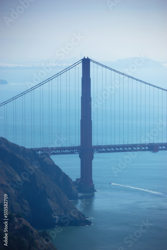 Golden Gate Bridge in San Francisco, America at night. Landscape and scenic bay view of city infrastructure, architecture design. Morning travel, commuting on famous water highway bridge to the city