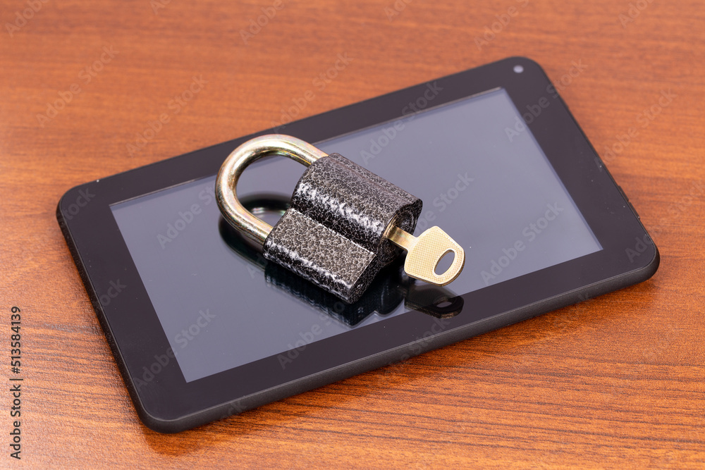 Padlock on a Tablet PC. Data security concept