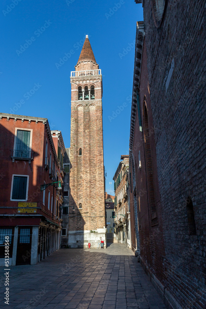 The bell tower of the Chiesa Rettoriale di San Polo church in Venice on a summer morning