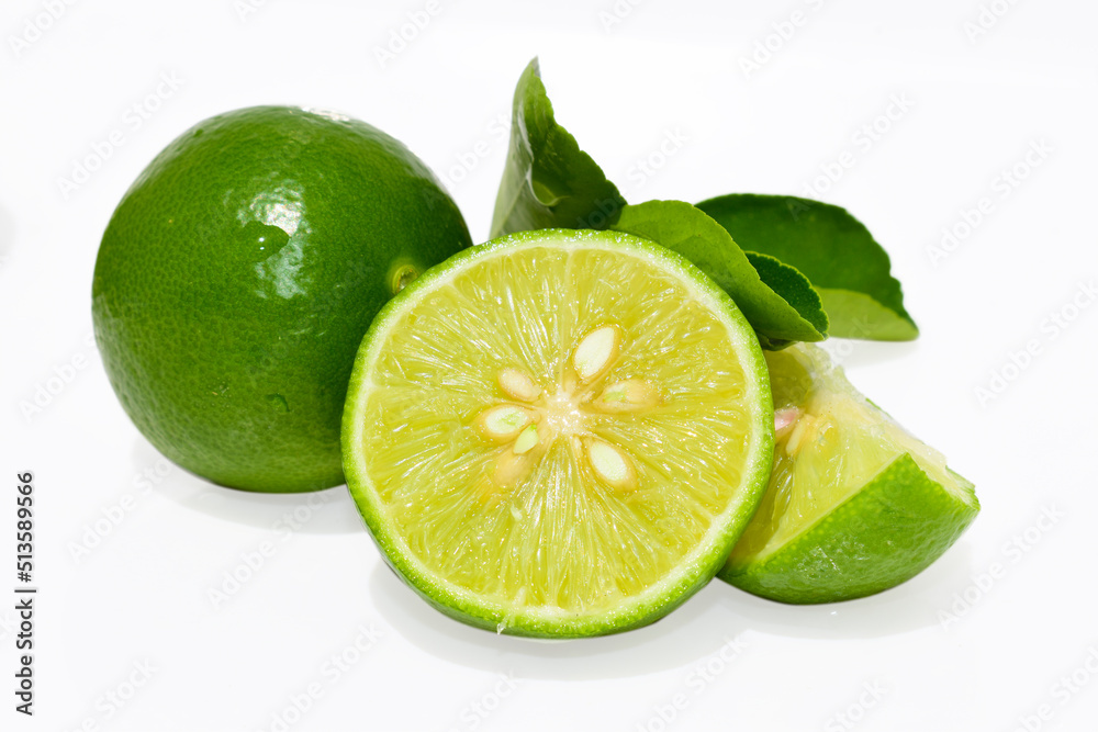 Fresh green lime (lemon) fruit isolated on white background