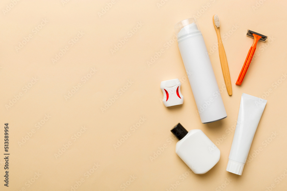 Composition with bath cosmetics on table. razor, toothpaste, soap, gel, toothbrush, mouthwash and other various accessories. Cosmetics for skin health. Bath Mockup for your logo Composition with bath cosmetics on table. razor, toothpaste, soap, gel, toothbrush, mouthwash and other various accessories. Cosmetics for skin health. Bath Mockup for your logo