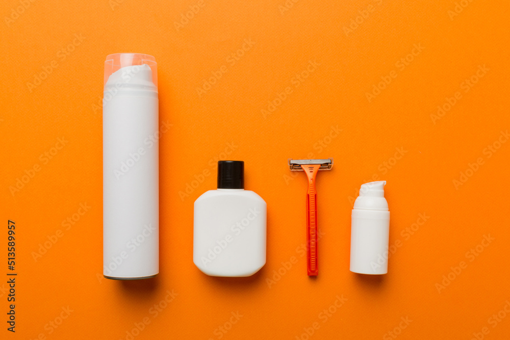 shaving man set. shaving machine, towel, lotion and shaving foam on colored background. Men bath Accessories top view shaving man set. shaving machine, towel, lotion and shaving foam on colored background. Men bath Accessories top view