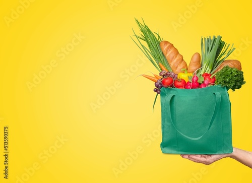 Online grocery shopping and home delivery, a bag full of groceries
