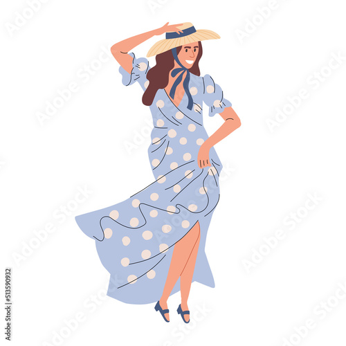 A girl in a long blue dress is dancing. Happy woman dancing salsa and bachata